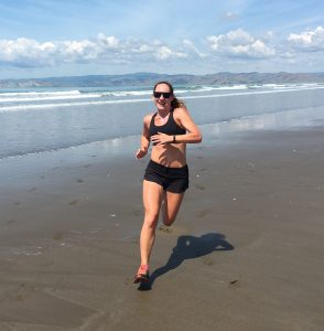 Sarah running on the beach